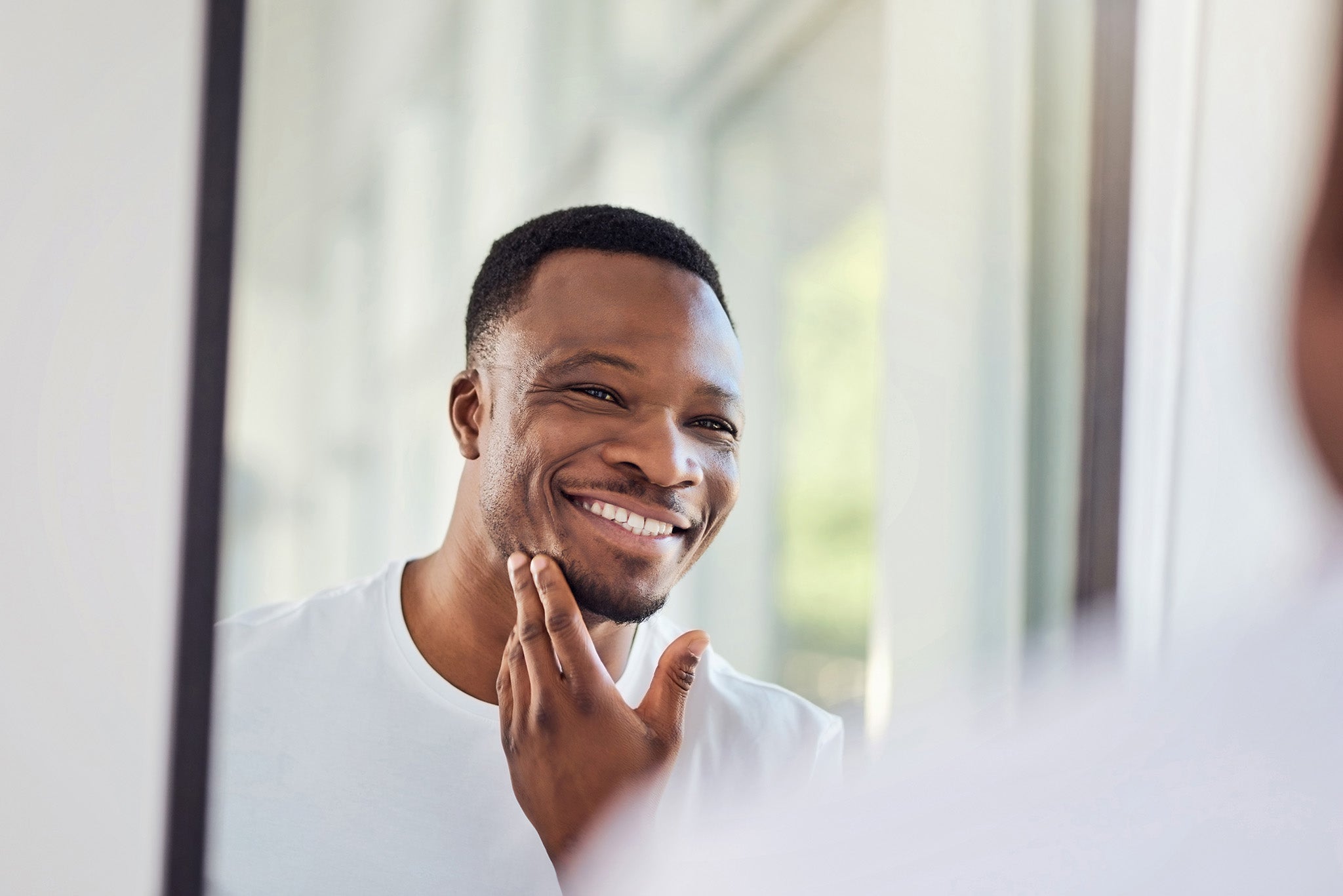 Man with clear skin from laser skin treatments